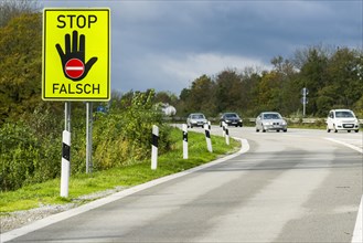 German signpost indicating not to enter the highway in the wrong direction