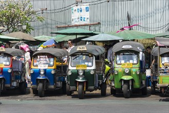 Tuktuk taxis parked in the street