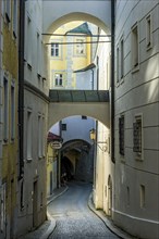 Narrow alleyway with flying buttresses