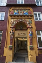 Colourful Renaissace-style entrance portal of the Raths-Apotheke pharmacy