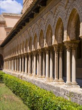Cloister with ornate pillars in the Cathedral of Monreale or Santa Maria Nuova