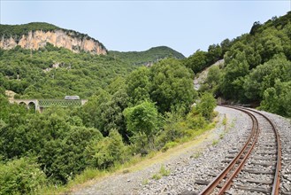 Trenino Verde narrow gauge railway from Arbatax to Manda on a bridge near Niala
