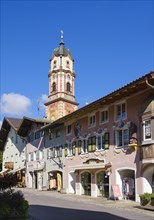 Historic houses in the town centre with church St. Peter and Paul