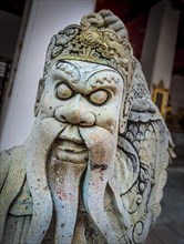 Terrifying Chinese stone statue