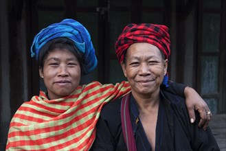 Men and woman of the ethnic group of the Pa-O wearing traditional clothing