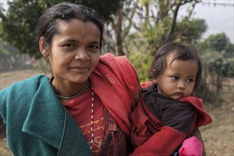 Nepalese woman with child