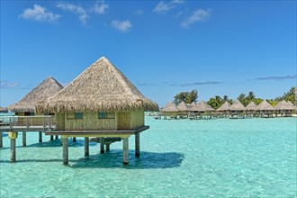 Overwater bungalows in the lagoon