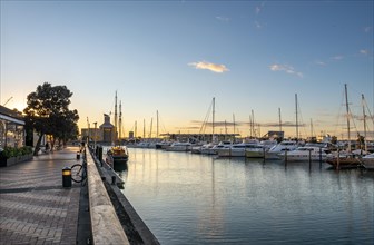 Promenade at the harbour at sunset