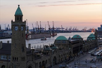 Historic Clock Tower and Hamburg Harbour at sunset