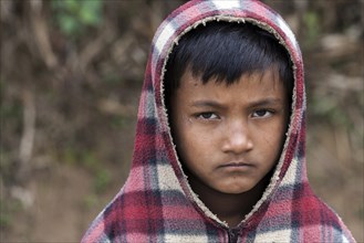 Nepalese boy with hood