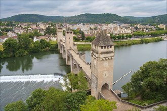 Medieval Pont Valentre bridge over the Lot River and town of Cahors