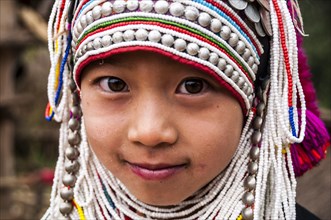 Traditionally dressed girl from the Akha people