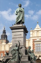 Statue of Adam Mickiewicz in front of Sukiennice