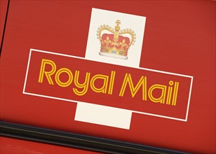 Royal Mail logo on the side of a postal van