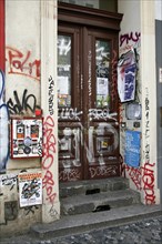 House entrance with graffiti