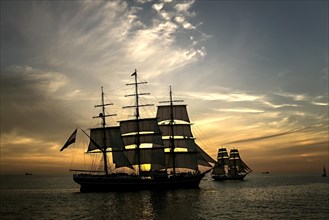 Evening sail with the tall ship Stad Amsterdam at the front