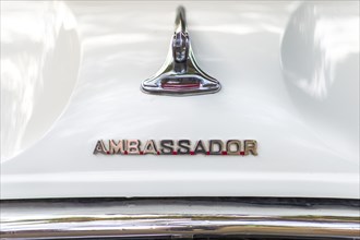 Emblem on a white Ambassador