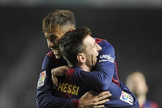 Neymar and Lionel Messi cheering