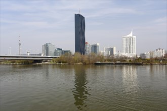 Donauturm or Danube Tower and Kaisermuhlen district with UNO City