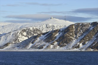 Honningsvag radar station on a mountain peak of Mageroya