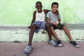 Cuban boys in Plaza San Juan de Dios