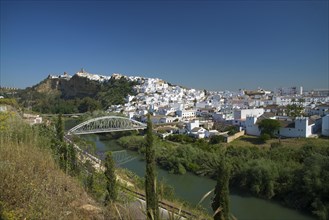 View over the Rio Guadalete on the old town of Arcos de la Frontera