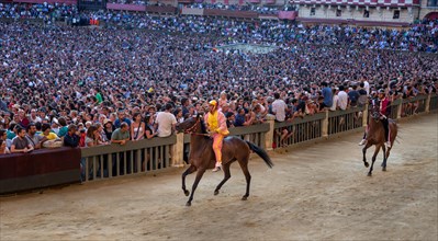 The Palio di Siena horse race on Piazza del Campo