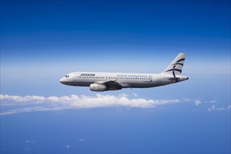 SX-DGD Aegean Airlines Airbus A320-232 in flight over the Mediterranean Sea