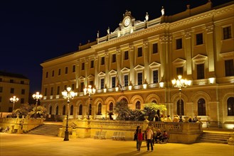 Palazzo della Provincia in Piazza d'Italia at night