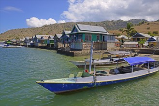 Typical stilt houses at the harbour of the village of Komodo