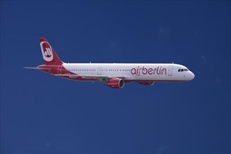 D-ALSA Air Berlin Airbus A321-211 in flight against blue sky
