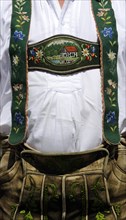 Man in lederhosen with embroidered suspenders