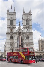 Red double-decker bus in front of Westminster Abbey