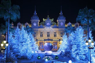 Square of the Monte-Carlo Casino at Christmas time with illuminated Christmas trees