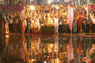 Hindu believers during a religious ceremony