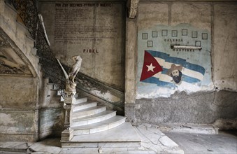 Wall painting with national flag and Camilo Cienfuegos