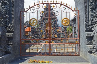 Gate with swastika