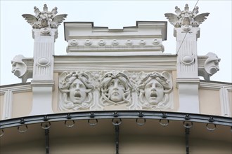 Three heads of Medusa on the facade of the house Alberta iela