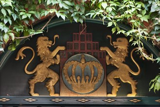 Two lions with a crown above the entrance of the Luneburg Kronenbrau
