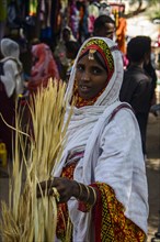 Woman shopping on the colourful Monday market of Keren