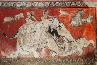 Old mural depicting a lion hunt in the City Palace of the Maharaja