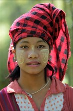 Palaung woman with thanaka on her face