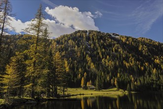 House at Etrachsee Lake in autumn
