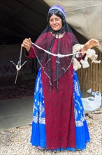 Qashqai woman spinning wool