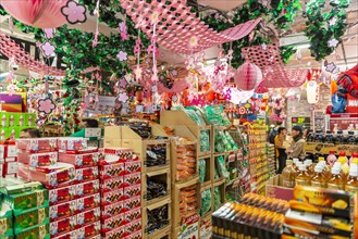 Piled packs of sweets in the decorated shop for the Hanami Fest