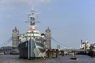 Tower Bridge behind the HMS Belfast museum ship of the Imperial War Museum