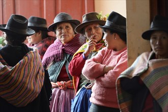 Women wearing traditional Andean clothing