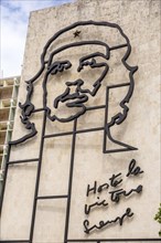 Ernesto Che Guevara as an art installation and propaganda work of art on a house wall on Revolution Square