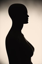 Silhouette of undressed female mannequin