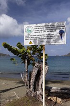 Warning sign on the beach
